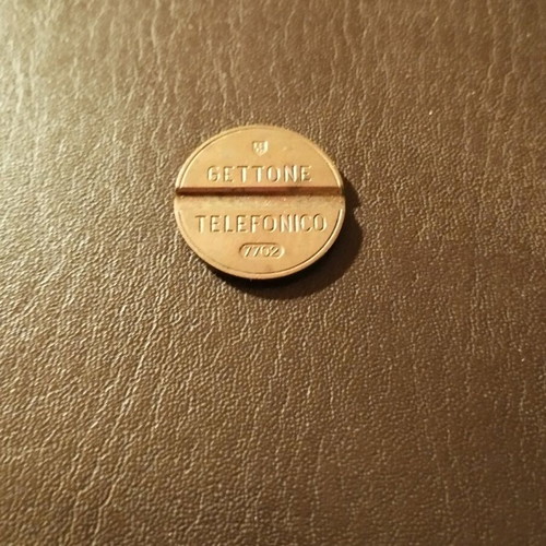 Telephone coin like new 7702