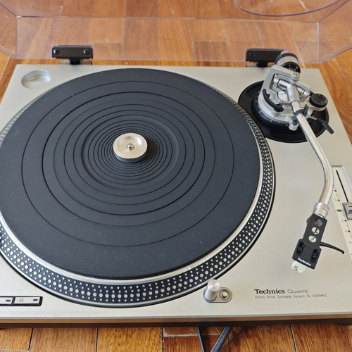 Technics SL-1200MK2 turntable with professional cartridge and dust cover
