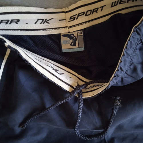 Nike vintage kids' swim shorts, size 10, navy blue