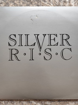 Silver Risc Anything She Does LP used, metal, first press