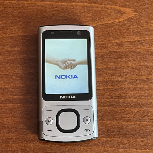 Nokia 6700s phone used with metal body and original battery
