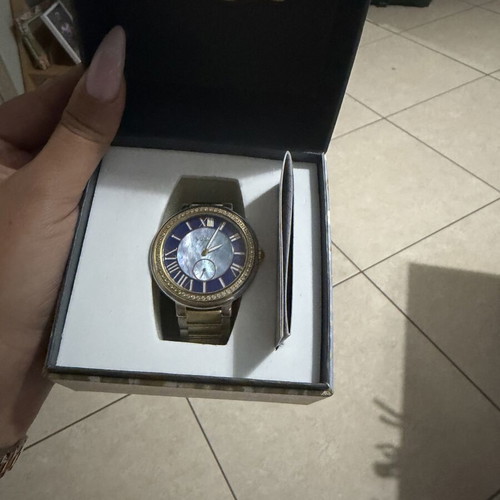 Vogue women's watch used, gold and silver colors