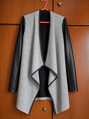 Cardigan with black faux leather sleeves, one size