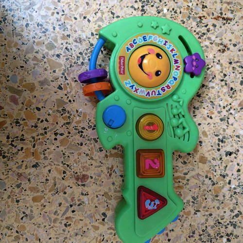 Fisher Price musical guitar used with English songs