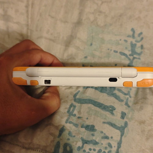 Nintendo 2DS XL with Mario Kart 7, charger and stylus