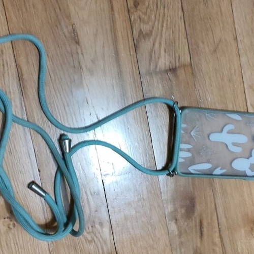 Hanging phone case used with cactus design in greenish color
