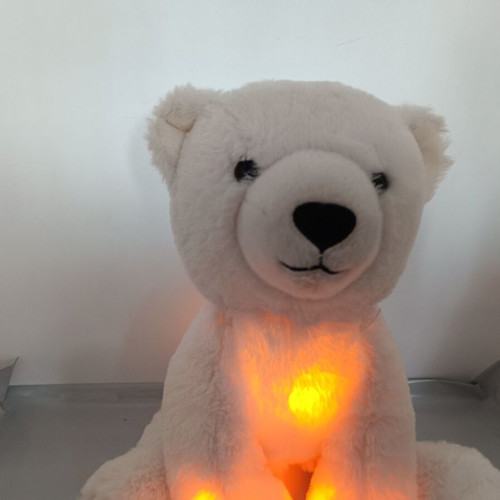 White glowing McDonald's bear used
