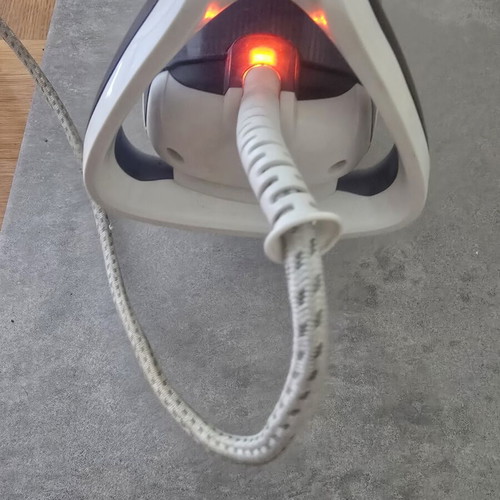 Tefal iron used with side crack and tip damage, functional