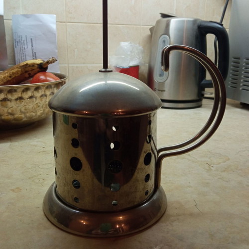 French press coffee maker used, stainless steel without carafe