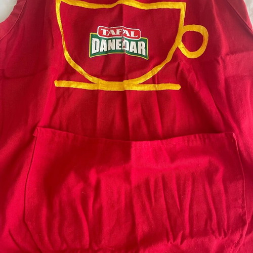 Kitchen apron used with worn logo