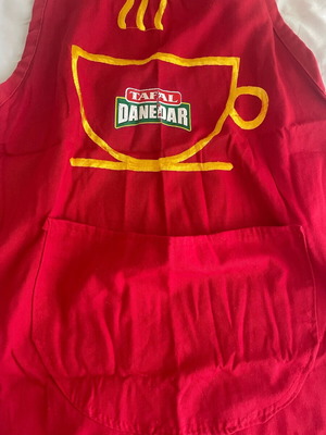 Kitchen apron used with worn logo