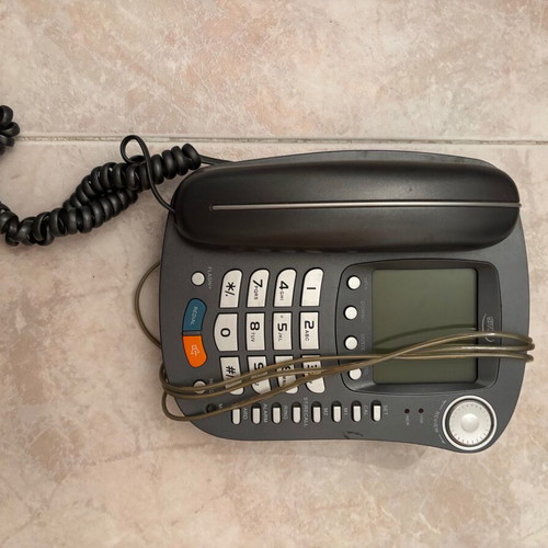 Corded phone used, gray, functional