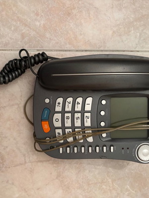 Corded phone used, gray, functional