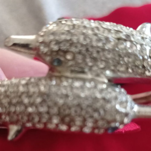 Bangle bracelet with dolphin design and sparkling rhinestones like new, silver