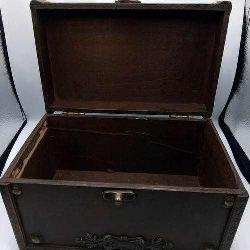 Vintage wooden box with decorative elements like new