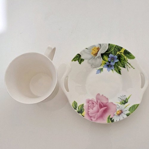 Porcelain cup and saucer set like new