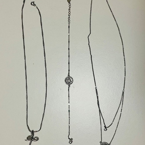 Silver cross, necklace and bracelet set like new