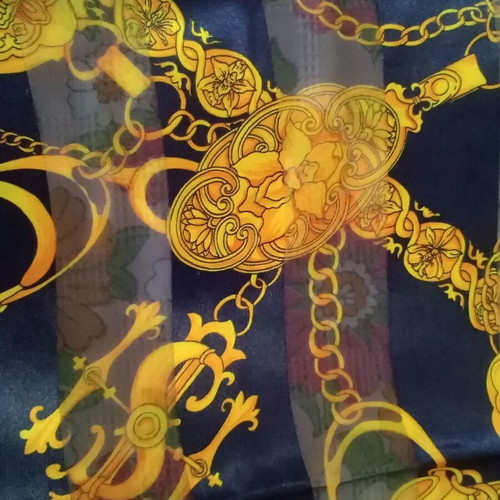 Women's semi-transparent scarf like new, blue with gold designs