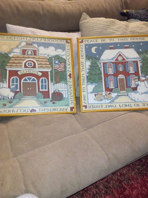 Large old textile paintings protected with glass