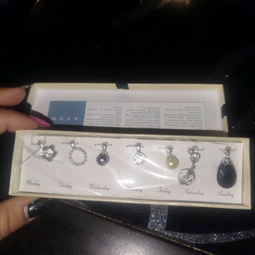 Calendar by AVON necklace set new, silver, in case