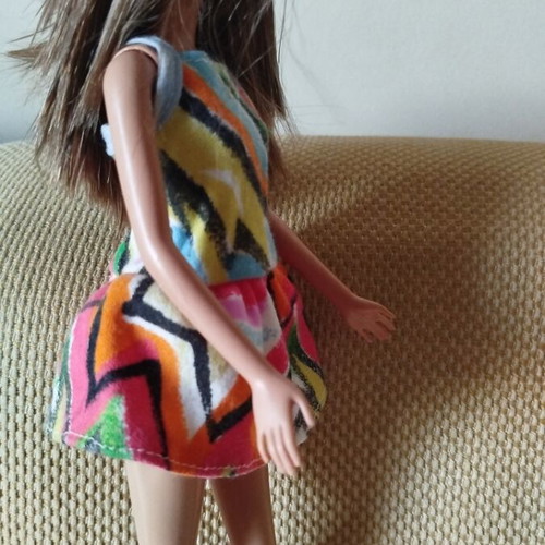 Barbie Fashionistas doll like new with colorful geometric dress and orange boots