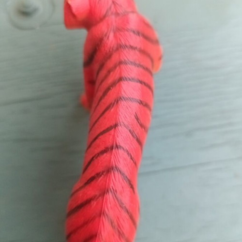 Realistic plastic tiger figure, about 10 cm