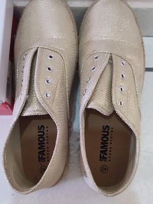 Famous Sneakers women's size 40 like new, gold color