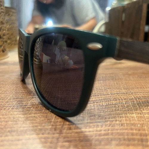 Jägermeister collectible sunglasses with bamboo arms, dark green frame