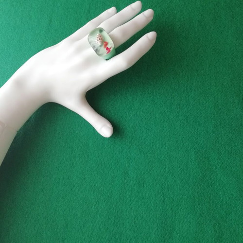 Blown glass ring with shell in transparent green color new