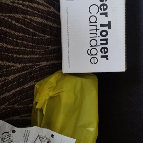 Laser Toner Cartridge new, possibly yellow