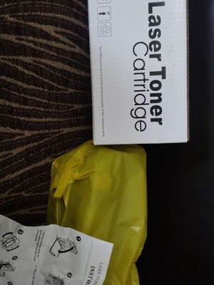 Laser Toner Cartridge new, possibly yellow
