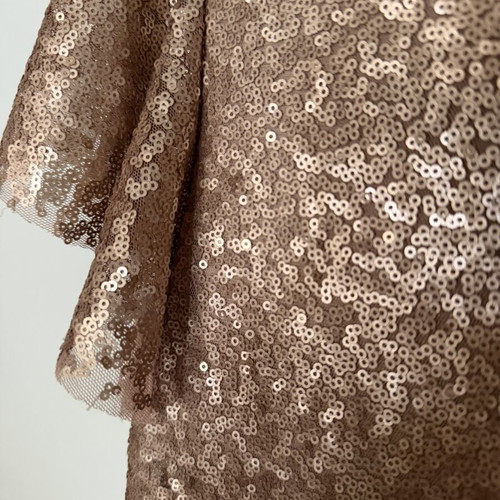 Short dress with sequins in pink gold, like new