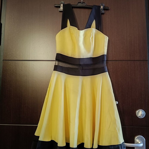 Cocktail dress with transparency at the waist like new, size M