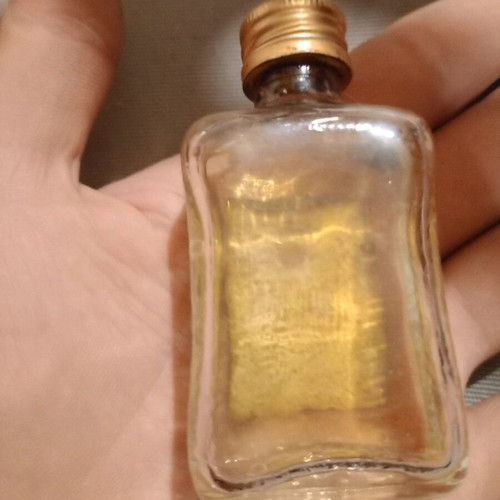 Di Saronno Amaretto mini bottle 60s used, opened