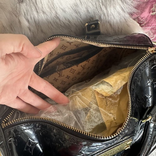 Louis Vuitton old black bag with gold accessories