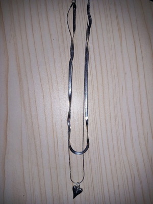 Heart necklace with long silver pendant like new