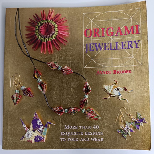Origami Jewelry book like new, more than 40 designs to fold and wear