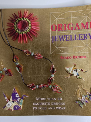 Origami Jewelry book like new, more than 40 designs to fold and wear