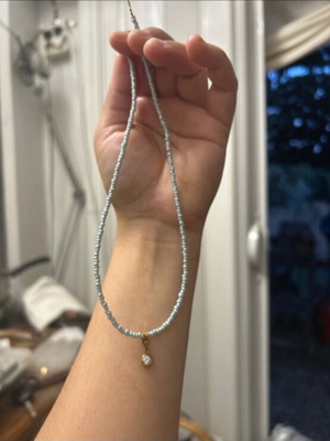 Handmade necklace with steel clasp and turquoise bead like new