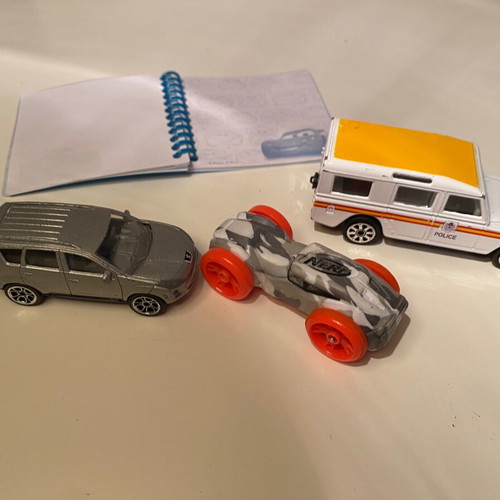 Set of used metal cars and nerf with MacQueen notebook gift