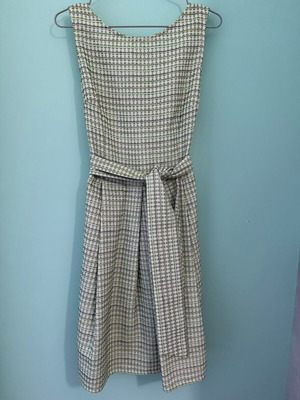 BO2 sleeveless A-line dress with green geometric brocade pattern