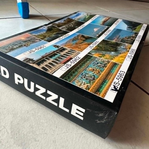 Two puzzles with 300 and 644 pieces, Chinese dragon relief and space planets
