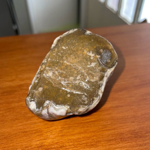 Brown flint new with smooth surface and natural texture