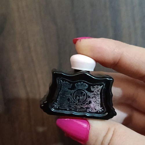 Collection of 29 empty perfume miniatures like new
