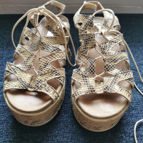 Animal print leather flatforms used, size 38, black and beige