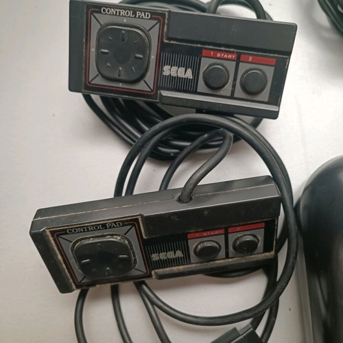 Sega Master System II used with two controllers and original cables