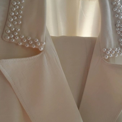 Linen tayeur handmade with embroidery and beads in white color