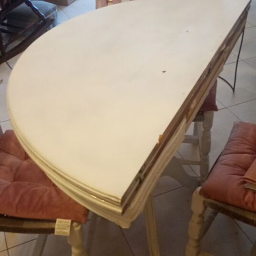 Vintage round dining table with 3 wooden chairs and rattan seats