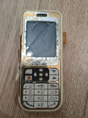 Nokia 7360 used for parts, external condition poor but seems functional