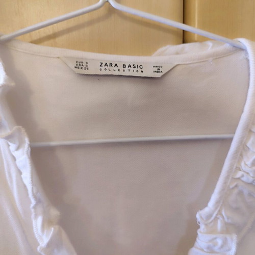 Zara shirt cotton embroidered with black thread and white pearls like new, oversized